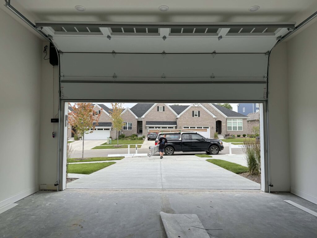 Residential garage door with professionally installed opener system